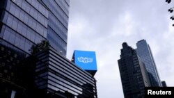 FILE - An advertisement for Skype is seen over 42nd Street in Manhattan, New York.