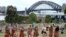 FILE - Traditional Aboriginal dancers perform on Australia Day in Sydney, Australia.