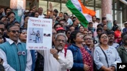 Protesters demand further investigation as they suspect more people were involved in the crime, after a court sentenced Sanjay Roy, a police volunteer, to life in prison in the rape and killing of trainee doctor last year, in Kolkata, India, Jan. 20, 2025.