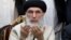 Afghan warlord Gulbuddin Hekmatyar prays before giving a speech to supporters in Jalalabad, Afghanistan, April 30, 2017. 