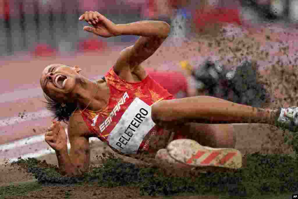 Ana Peleteiro of Spain competes in the final of the women&#39;s triple jump at the 2020 Summer Olympics in Tokyo.