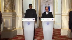 Shugaban Najeriya Muhammadu Buhari da na Faransa Francois Hollande a wani taron manema labarai