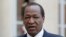 FILE - Blaise Compaore, who at the time was Burkina Faso's president, speaks to reporters in Paris, Sept. 18, 2012.