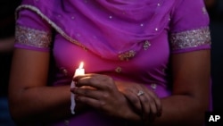 A candle light vigil was held in Milwaukee, Wisconisn for the victims of the Sikh Temple shooting, August 5, 2012.