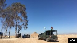 Kurd peshmerga jangchilari. Mosul, Iroq.