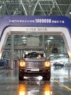 A brand-new H9 vehicle bearing a '1000000' label rolls off the production line at the Great Wall Motors' Chongqing smart factory in southwest China's Chongqing, marking the completion of the factory's one-millionth vehicle, Jan. 2, 2025.