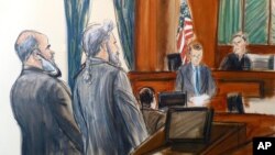 FILE - In this courtroom sketch, from left, Suliman Abu Ghaith stands next to his attorney, Stanley Cohen, as courtroom deputy Andrew Mohan, reads the verdict and Judge Lewis Kaplan, right, listens, March 26, 2014, at federal court in New York.