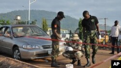 Explosion d'une bombe à Abuja, au Nigeria, le samedi 3 octobre 2015. (AP photo)