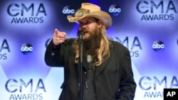 Chris Stapleton, winner of the awards for new artist of the year, album of the year for "Traveller," and male vocalist of the year, at the CMA Awards, Nov. 4, 2015. 