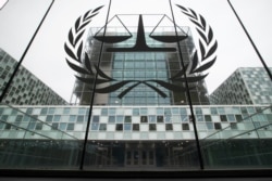 FILE- The building of the International Criminal Court (ICC) is seen in The Hague, Netherlands, Nov. 7, 2019.