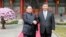 North Korean leader Kim Jong Un shakes hands with Chinese President Xi Jinping in Beijing, as he paid an unofficial visit to China, in this undated photo released by North Korea's Korean Central News Agency in Pyongyang, March 28, 2018. 
