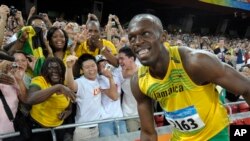 Usain Bolt souriant après avoir remporté le 100 mètres aux jeux Olympiques de Beijing, Chine, le 16 aout 2008