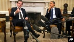 El presidente Barack Obama (derecha), recibió al primer ministro de España, Mariano Rajoy, en la Casa Blanca. 