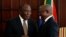 FILE - South African President Cyril Ramaphosa, left, talks with Deputy President David Mabuza in Pretoria, May 28, 2019. 
