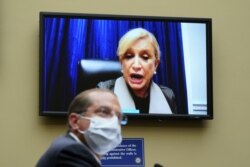 U.S. Secretary of Health and Human Services Alex Azar testifies to the House Select Subcommittee on the coronavirus disease crisis, as Rep. Carolyn Maloney (D-NY) speaks remotely, on Capitol Hill in Washington, Oct. 2, 2020.