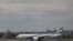 FILE - El Al Airlines Flight 28 races on the runway at Newark Liberty International Airport moments before taking off en route to Tel Aviv's Ben Gurion Airport, July 24, 2014, in Newark, N.J. 