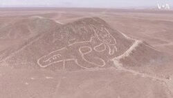 Drone Footage Reveals Ancient Cat Etched into Peru Hillside 