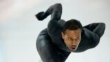 Shani Davis of the U.S. skates in the prototype of the official US Speedskating suit during a training session at the Adler Arena Skating Center at the 2014 Winter Olympics, Feb. 14, 2014.