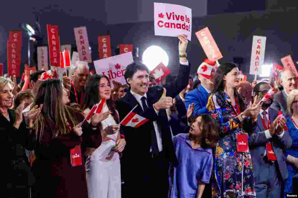 Canadian Prime Minister Justin Trudeau gestures next to his daughter Ella-Grace Trudeau on the day members of Canada's Liberal Party gather to choose his successor, in Ottawa, Ontario, March 9, 2025. 