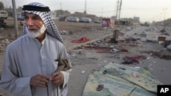 An Iraqi man stands near a bombing site in Baghdad in August 2009. The book, ''The Strong Horse," asserts Arab culture is to blame for violence in the Middle East and for the failure of peace initiatives.