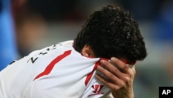  Luis Suarez na Liverpool ke rufe fuskarsa bayan wani wasa 