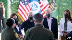 Vice President Kamala Harris talks to Gloria Chavez, Chief Patrol Agent of the El Paso Sector, as she tours the U.S. Customs and Border Protection Central Processing Center, June 25, 2021, in El Paso, Texas.