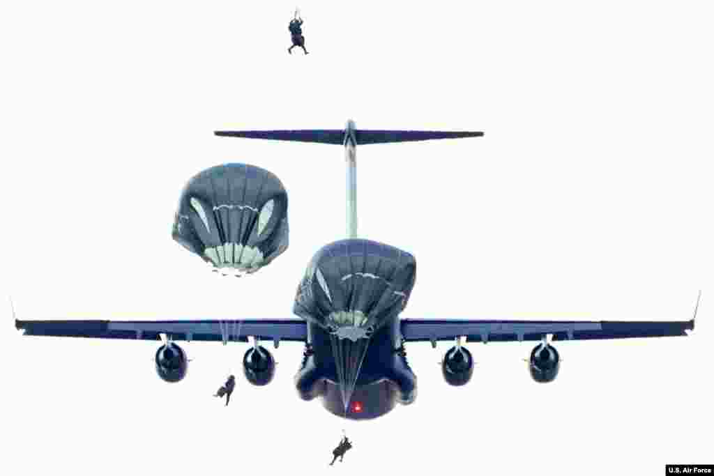 U.S. Army paratroopers jump out of an aircraft at Joint Base Elmendorf-Richardson, Alaska. (U.S. Air Force/Justin Connaher) 