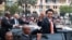 Le président nouvellement élu de Madagascar, Andry Rajoelina, fait signe à sa voiture à Analakely, à Madagascar, le 8 janvier 2019.