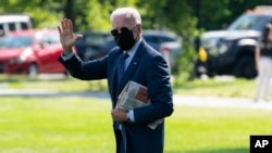 President Joe Biden walks to board Marine One on the Ellipse near the White House for a trip to Delaware, June 2, 2021, in Washington.