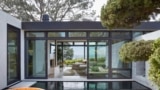 This photo provided by KAA Design Group shows the Tree House's primary suite private courtyard with Japanese wood soaking tub and reflecting pool. (KAA Design Group via AP)