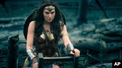 This image released by Warner Bros. Entertainment shows Gal Gadot in a scene from "Wonder Woman." The movie opens June 2 based on the DC Comics character.