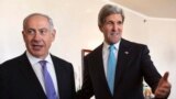 U.S. Secretary of State John Kerry gestures as he meets Israeli Prime Minister Benjamin Netanyahu in Jerusalem, June 28, 2013. 