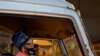 VOA Hausa journalist Grace Alheri Abdu pictured in a bakery delivery van on Nov. 28. A delivery driver drove her to Port Harcourt after she was detained by soldiers. (VOA Housa)
