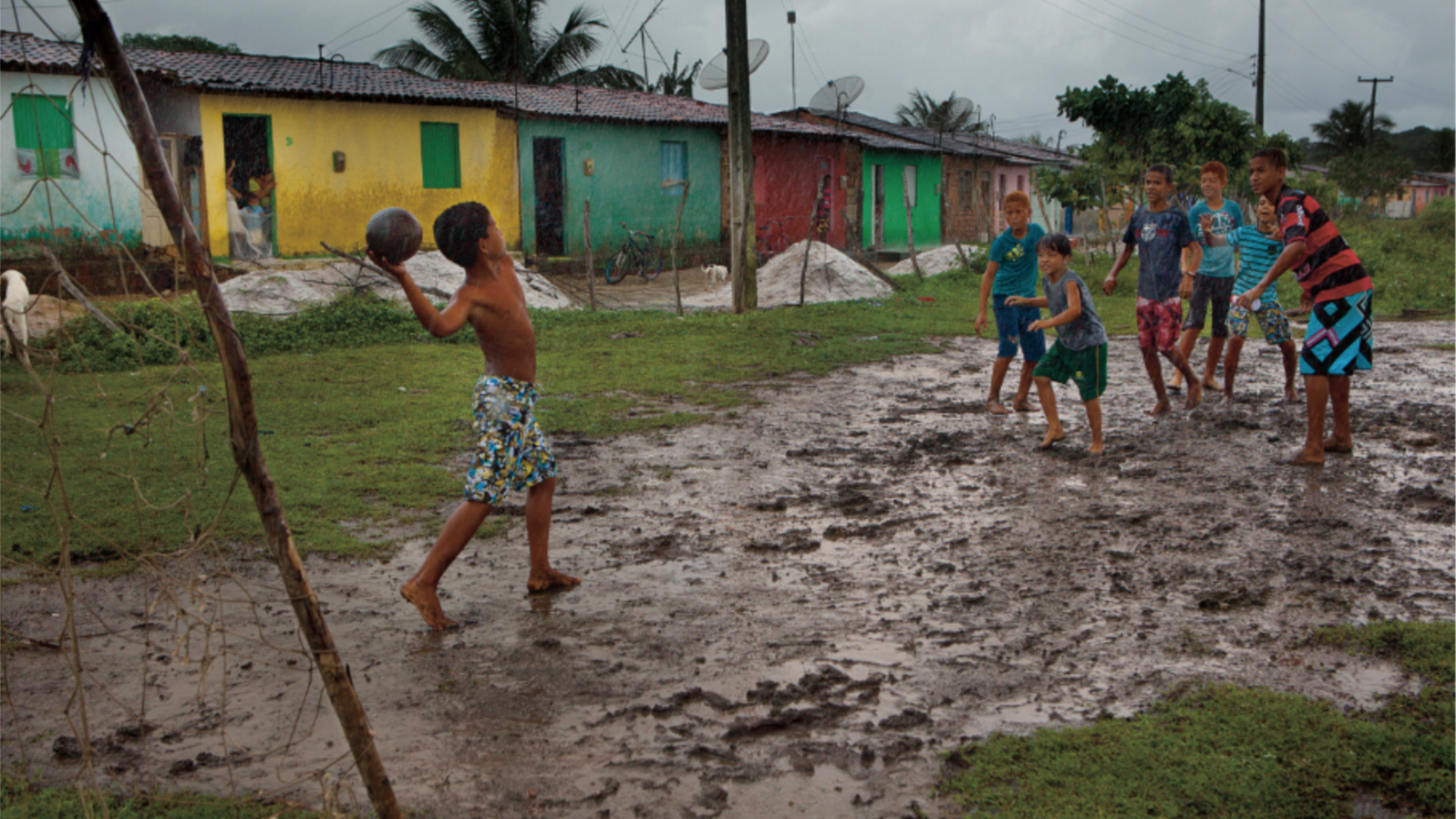 Boys playing soccer. Photo by Caio Vilela.