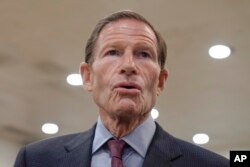 FILE - Senator Richard Blumenthal, D-Ct., speaks with reporters on Capitol Hill, October 4, 2023, in Washington.