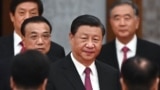 Xi