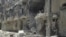 Damaged buildings in Aleppo's district of Salah Edinne, August 3, 2012. 