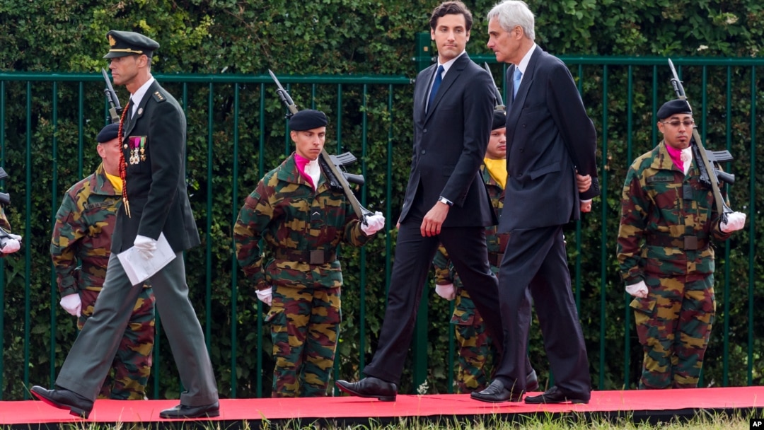 Charles Napoleon Bonaparte (r) and his son Jean-Christophe Napoleon Bonaparte arrive for the official Belgian ceremony to commemorate the bicentenary of the battle of Waterloo at the Lion's Mound in Braine-l'Alleud, near Waterloo, Belgium, June 18, 2015.