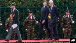 Charles Napoleon Bonaparte (r) and his son Jean-Christophe Napoleon Bonaparte arrive for the official Belgian ceremony to commemorate the bicentenary of the battle of Waterloo at the Lion's Mound in Braine-l'Alleud, near Waterloo, Belgium, June 18, 2015.