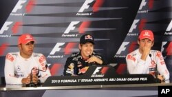 From left to right: Lewis Hamilton, Sebastian Vettel and Jenson Button following the Abu Dhabi Grand Prix.