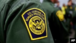 FILE - Border Patrol agents hold news conference prior to a media tour of a new U.S. Customs and Border Protection temporary facility in Donna, Texas, May 2, 2019.