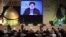 FILE - Lebanon's Hezbollah leader Sayyed Hassan Nasrallah addresses his supporters via a giant screen during a rally marking Hezbollah's Martyrs' Day in Beirut's suburbs, Lebanon.