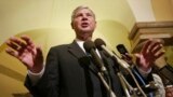 FILE - Then-Senate Intelligence Committee Chairman Sen. Bob Graham, D-Fla., gestures as he answers questions regarding the ongoing security hearing on Capitol Hill, June 18, 2002, in Washington. Graham died April 16, 2024.