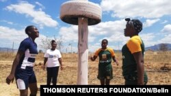 Velme Nyarumwe, with their coach Patricia Mukunike-Chakanya, Cathrine Muranganwa and Trish Kandemiri in the newly erected jungle gym at Sahumani Secondary. Honde Valley, September 11 2020, Thomson Reuters Foundation/Farai Shawn Matiashe