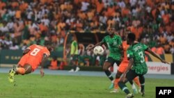 Ivory Coast's midfielder Franck Kessie heads the ball to score a goal during the final of the 2023 Africa Cup of Nations against Nigeria at Alassane Ouattara Olympic Stadium in Ebimpe, Abidjan, February 11, 2024.