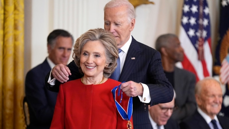 Biden honors Clinton, Bono, Goodall, others for contributions