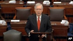 FILE - Senate Republican Majority Leader Mitch McConnell speaks on the floor of the Senate at the U.S. Capitol in Washington, Jan. 21, 2020.