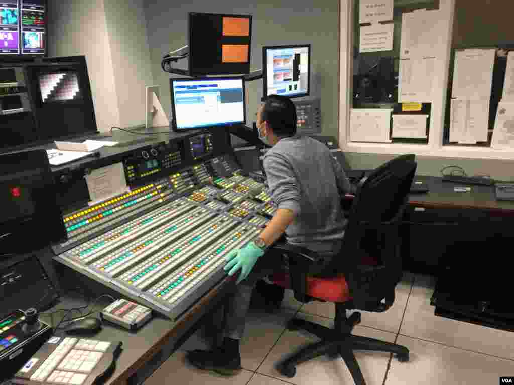 VOA&#39;s Sonny Tang hard at work in studio.