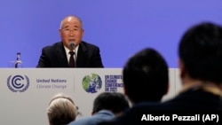 China's Special Envoy for Climate Change Xie Zhenhua speaks at the COP26 U.N. Climate Summit in Glasgow, Nov. 10, 2021. (AP/Alberto Pezzali)