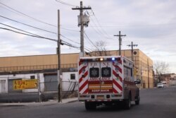 An ambulance with sirens travels through the city during the outbreak of coronavirus disease (COVID-19) in Brooklyn, New York, U.S., April 4, 2020. Picture taken April 4, 2020. REUTERS/Caitlin Ochs